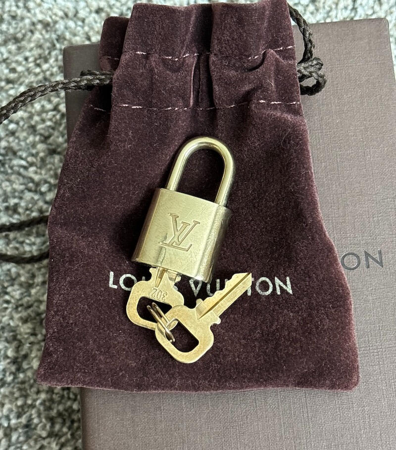Louis Vuitton padlock and key set