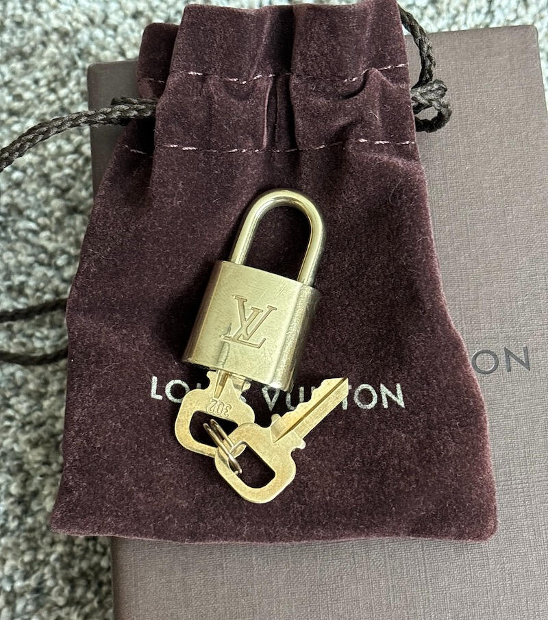 Louis Vuitton padlock and key set